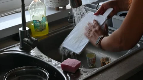 Washing the dishes Stock Footage 247834390