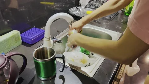 Washing dishes in kitchen of mess Stock Footage 232398184