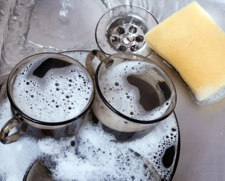 Washing dishes. Stock Photos