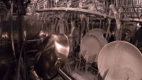 Washing dishes process inside the dishwasher Stock Footage 261696027