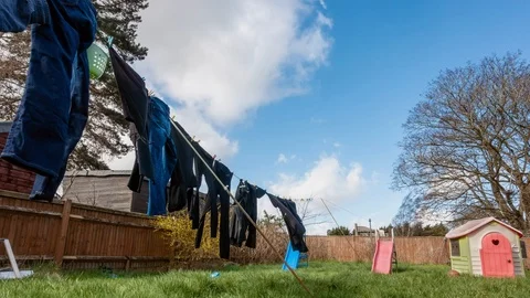 Washing drying in the garden Stock Footage 104516379
