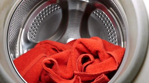 Washing drying machine with red towel in laundry Stock Footage 61368655