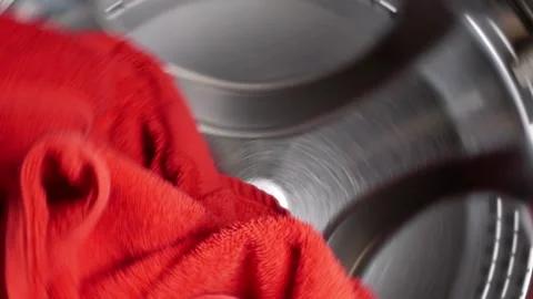 Washing drying machine with red towel in laundry Stock Footage 91164968