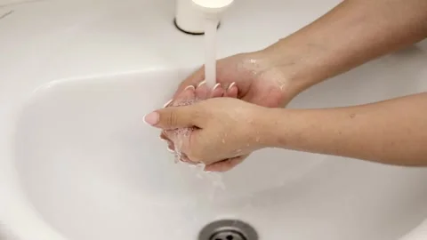 Washing female hands with soap close up Stock Footage 249014499