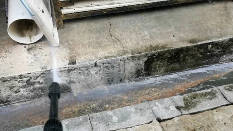 Washing floor using high pressure water jet Stock Footage 124178446