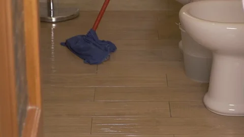 Washing floors with a rag Stock Footage 125433300