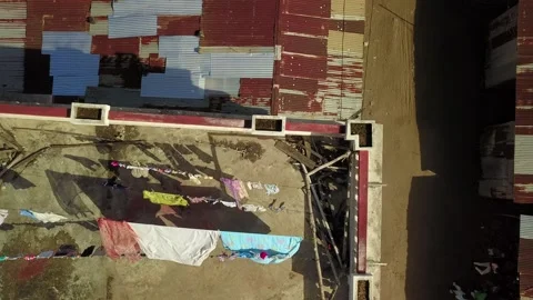 Washing fluttering on the rooftop line Stock Footage 276680361