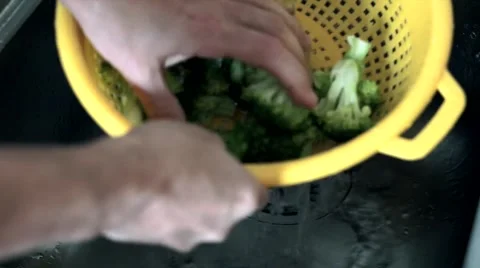 Washing fresh  broccoli vegetables under water Stock Footage 44173205