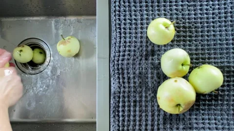 Washing Fresh Green Apples in Kitchen Sink Видео 343865072