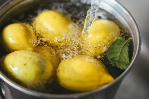 Washing fresh lemons Stock Photos