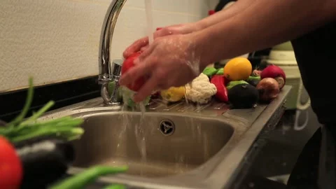 Washing Fresh Vegetables In A Kitchen Sink Stock Footage 343738017