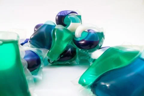 Washing gel capsules stack on white background Dissolving laundry detergent 写真素材