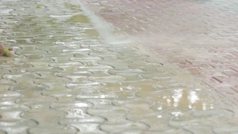Washing ground using pressure washer Stock Footage 166823908