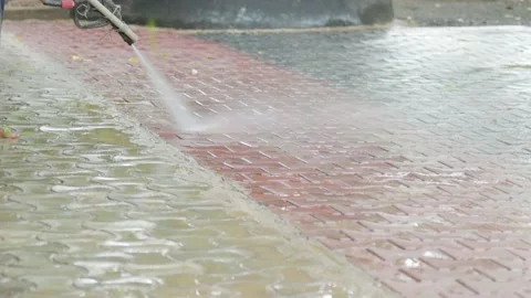 Washing ground using pressure washer Video stock 166823911