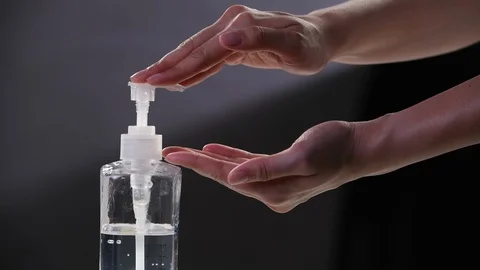 Washing hand by using alcohol gel . Stockbeeldmateriaal 126355884