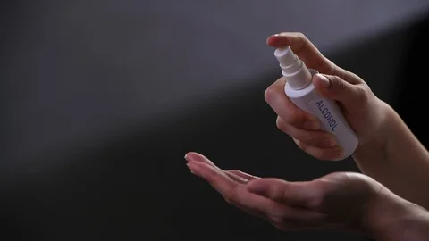 Washing hand by using alcohol spray . Stock Footage 126355863