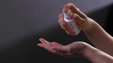 Washing hand by using alcohol spray . Stock Footage 126356262