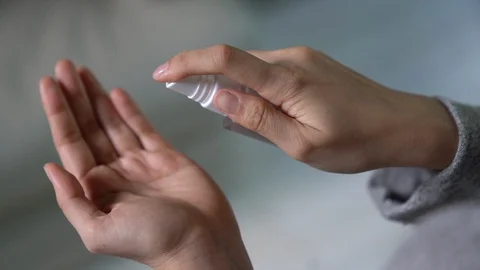Washing hand by using alcohol spray to prevent coronavirus Stock Footage 128222278