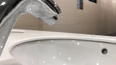 Washing hands with automatic sensor water tap. Energy saving concept. Stock Footage 105049328