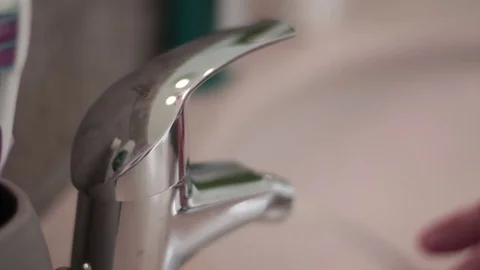 Washing Hands in Bathroom Stock Footage 72368923
