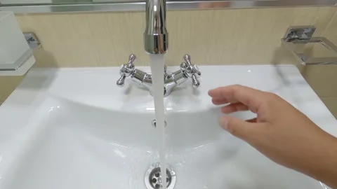 Washing hands in the bathroom Stock Footage 140241655