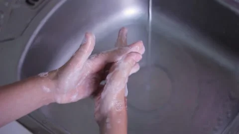 Washing hands close-up with soap in the kitchen Stock Footage 201615327