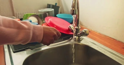 Washing hands in kitchen. Stock Footage 319068061