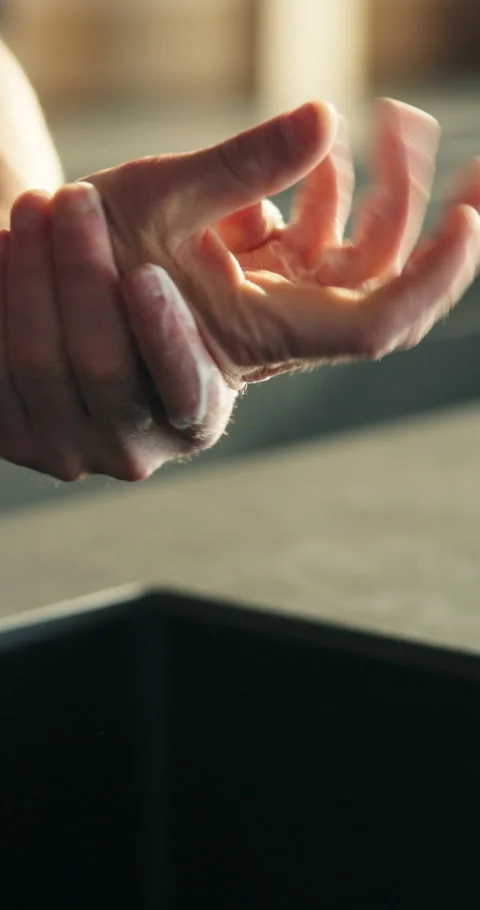 Washing hands, person and kitchen for foam, wellness and health with clean skin Stock Footage 343116228