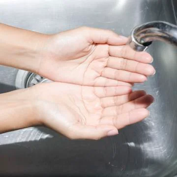 Washing hands Stock Photos