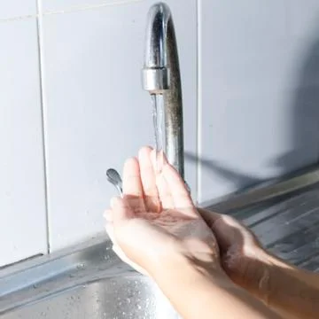 Washing hands Stock Photos