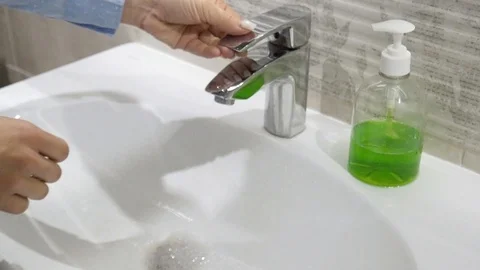 Washing hands as protective measures against coronavirus COVID-19 disease. MERS Stock Footage 127637835