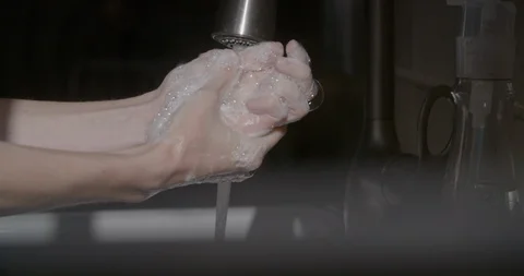Washing Hands in Slow Motion Stock Footage 128471554