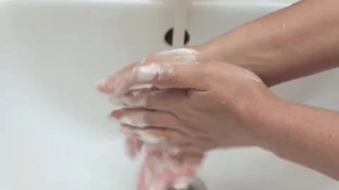 Washing hands with soap close up Video stock 239033141