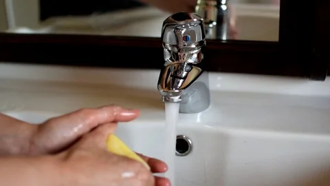 Washing hands with soap Stock Footage 76928674