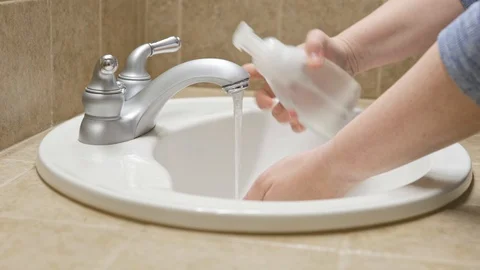 Washing hands with soap Stock Footage 127165222