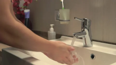 Washing hands with soap Stock Footage 143878327