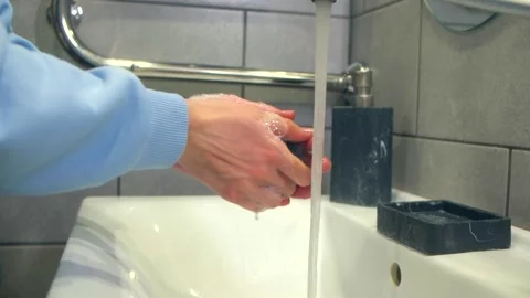 Washing hands with soap Video stock 261988977