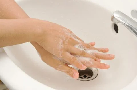 Washing of hands with soap Stock Photos