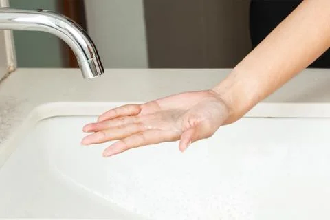 Washing hands with soap Stock Photos