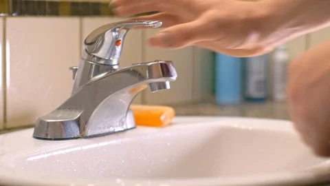 Washing hands with soap in sink to avoid corona virus infection Stock Footage 126259254