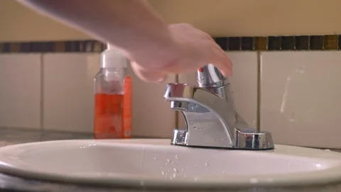 Washing hands with soap in sink to avoid corona virus infection Stock Footage 126260921