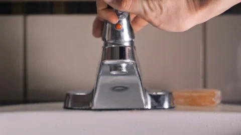 Washing hands with soap in sink to avoid corona virus infection Stock Footage 126262738