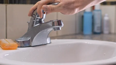 Washing hands with soap in sink to avoid corona virus infection Stock Footage 126263581