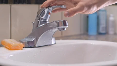 Washing hands with soap in sink to avoid corona virus infection Stock Footage 126264979