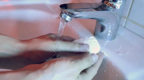 Washing of hands with soap under running water Stock Footage 53289856