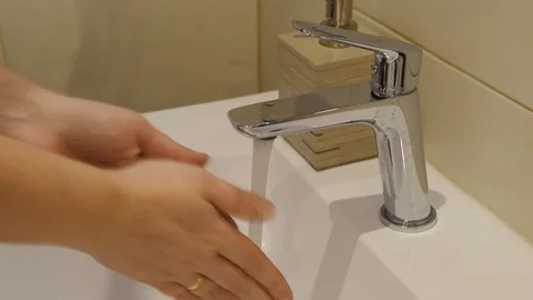 Washing of hands with soap under running water Stock Footage 127297742