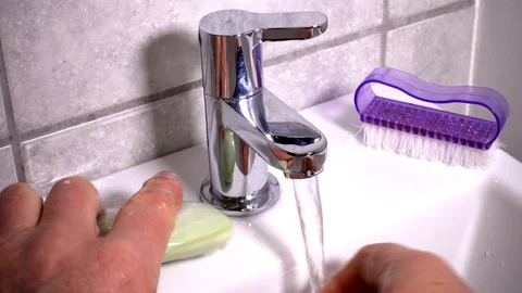 Washing hands under a tap. Stock-Footage 89202371