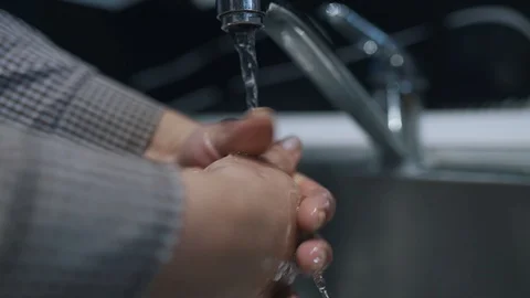 Washing hands under the tap Stock Footage 127792873