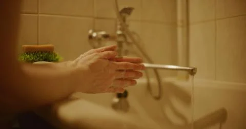 Washing hands with a view from the side Stock Photos