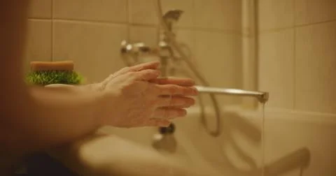 Washing hands with a view from the side Stock Photos